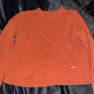 Burnt orange sweater